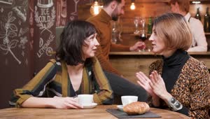   Stock Footage Two Women Chatting Over Coffee Live Wallpaper