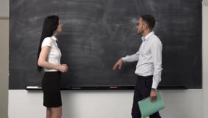   Stock Footage Two People Discussing A Project Live Wallpaper