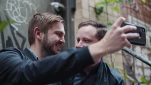  Stock Footage Two Men Taking A Selfie Live Wallpaper