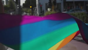   Stock Footage Two Men Holding A Rainbow Flag Live Wallpaper