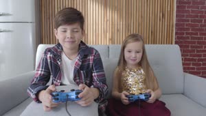   Stock Footage Two Kids Play Console Games And Celebrate Win Live Wallpaper