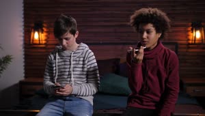   Stock Footage Two Boys Using Their Phones Live Wallpaper