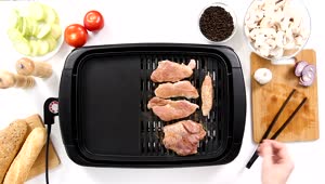   Stock Footage Turning Pork Chops On A Small Grill Live Wallpaper