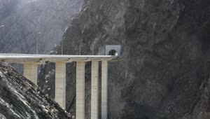   Stock Footage Truck Crossing A Concrete Bridge In The Mountain Live Wallpaper