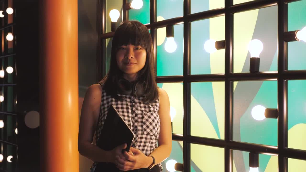 Download Stock Footage Woman Holding A Tablet Live Wallpaper Free