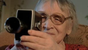 Stock Footage Woman Using A Retro Camera Inside Live Wallpaper Free