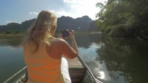 Stock Footage Woman Taking Photos During A Boat Tour Live Wallpaper Free