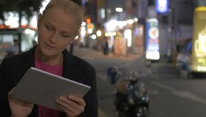 Stock Footage Woman Using A Tablet In Korea Live Wallpaper Free