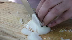 Stock Footage Woman Slicing A Small Onion With A Knife Live Wallpaper Free