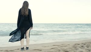 Stock Footage Woman In Black Looking Out Over The Ocean Live Wallpaper Free