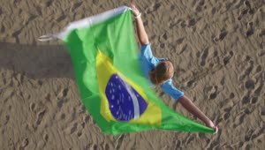 Stock Footage Woman Holding The Brazilian Flag In The Wind Live Wallpaper Free