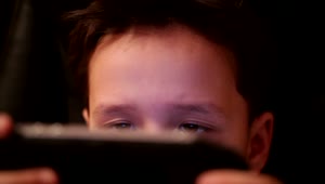 Stock Footage Young Boy Playing A Video Game Quietly Live Wallpaper Free