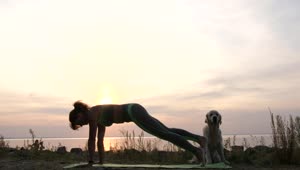 Stock Footage Woman Exercising As The Sun Goes Down Live Wallpaper Free