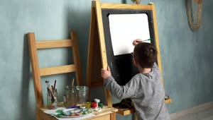 Stock Footage Young Boy Drawing A House Live Wallpaper Free