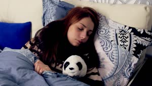 Stock Footage Woman Sleeping With A Toy Panda Live Wallpaper Free