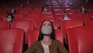 Stock Footage Woman Wearing A Mask At The Cinema Live Wallpaper Free