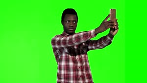 Stock Footage Young Man Doing A Selfie On A Green Screen Live Wallpaper Free