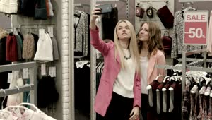 Stock Footage Young Women Doing Selfie In A Clothing Store Live Wallpaper Free