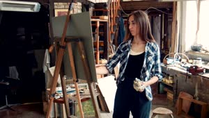 Stock Footage Young Woman Painting In The Studio Live Wallpaper Free