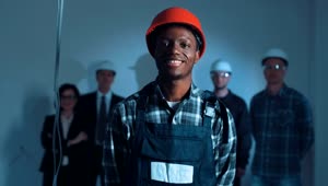 Stock Footage Young Construction Worker Posing With Helmet Live Wallpaper Free