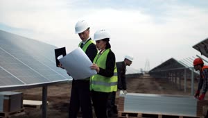 Stock Footage Workers Of Solar Energy Plant Outdoors Live Wallpaper Free