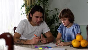 Stock Footage Young Father Teaches His Son To Do His Homework Live Wallpaper Free