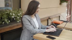 Stock Footage Woman Working Remotely From A Coffee Shop Live Wallpaper Free