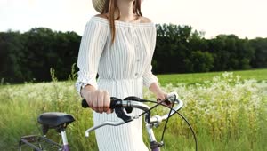 Stock Footage Woman Walking By The Countryside With Her Bicycle Live Wallpaper Free