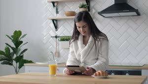 Stock Footage Woman Works On Her Tablet In The Morning Live Wallpaper Free