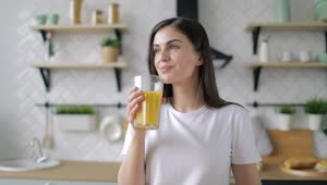 Stock Footage Woman Drinking Orange Juice In The Morning Live Wallpaper Free