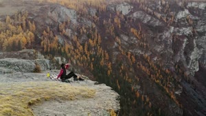 Stock Footage Woman On A Cliff With Mountains In The Background Live Wallpaper Free