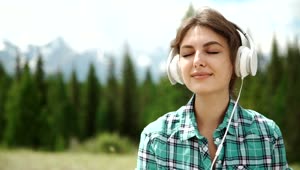 Stock Footage Woman Feels Happiness When Listening To Music Live Wallpaper Free