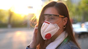 Stock Footage Woman Using A Face Mask In The Street Live Wallpaper Free