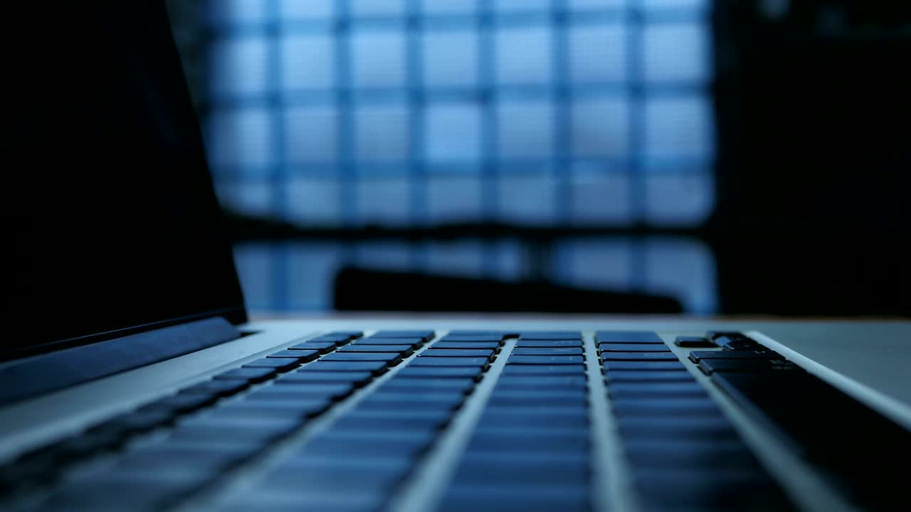 Download Stock Footage Working On A Laptop At Night Live Wallpaper Free