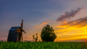 Stock Footage Wooden Windmill At A Beautiful Sunset Live Wallpaper Free