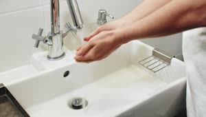 Stock Footage Woman Washing Hands In Bathroom Sink Live Wallpaper Free