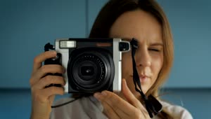 Stock Footage Woman Taking A Picture With An Instant Camera Live Wallpaper Free