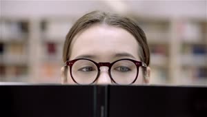 Stock Footage Woman Eyes With Glasses Reading A Book Live Wallpaper Free