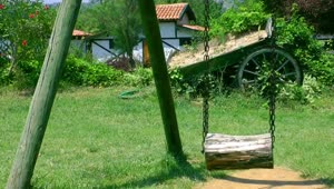 Stock Footage Wooden Swing In The Garden Of A Country House Live Wallpaper Free