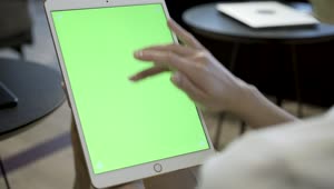 Stock Footage Woman Swiping Fingers On A Tablet Live Wallpaper Free
