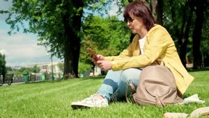 Stock Footage Woman Texting On Social Media In The Park Live Wallpaper Free