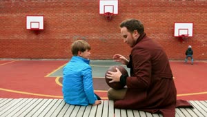 Stock Footage Young Man And His Little Brother On The Basketball Playground Live Wallpaper Free
