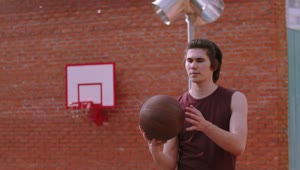 Stock Footage Young Man Spinning A Basketball Ball On The Finger Live Wallpaper Free