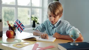 Stock Footage Young Boy Studies In English Classroom Live Wallpaper Free