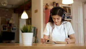 Stock Footage Woman Listens To Headphones And Daydreams Live Wallpaper Free