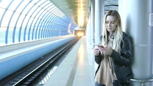 Stock Footage Young Woman Texting On Her Mobile Phone At The Metro Live Wallpaper Free