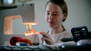 Stock Footage Young Woman Working On A Sewing Machine Live Wallpaper Free