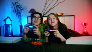 Stock Footage Young Couple Playing Video Games On The Bed Live Wallpaper Free