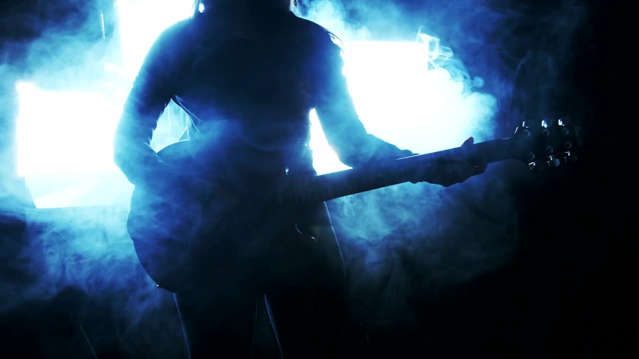 Download Stock Footage Young Woman Playing Guitar Live Wallpaper Free
