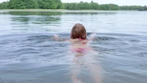 Stock Footage Woman Swimming Away Over A Lake Live Wallpaper Free